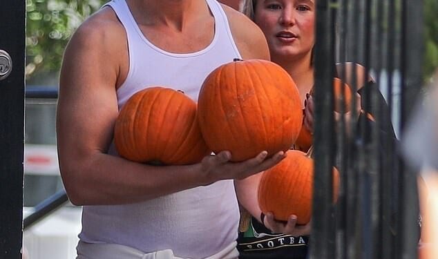 Christopher Schwarzenegger looked just like his bodybuilding and acting legend father Arnold as he continued to showoff his stunning body transformation and red hot romance