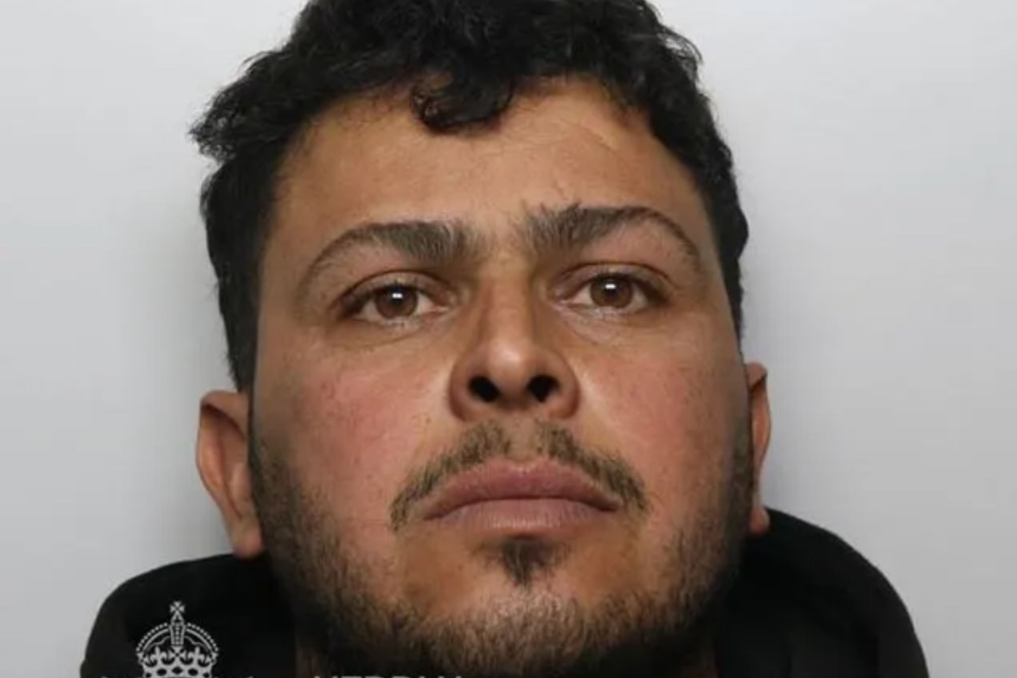 An image collage containing 1 images, Image 1 shows Mugshot of Fawaz Alsamaou