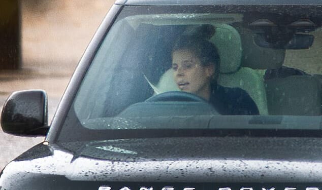 Princess Beatrice drives from Royal Lodge, home of her father Prince Andrew and mother Sarah Ferguson, at Windsor in Berkshire today