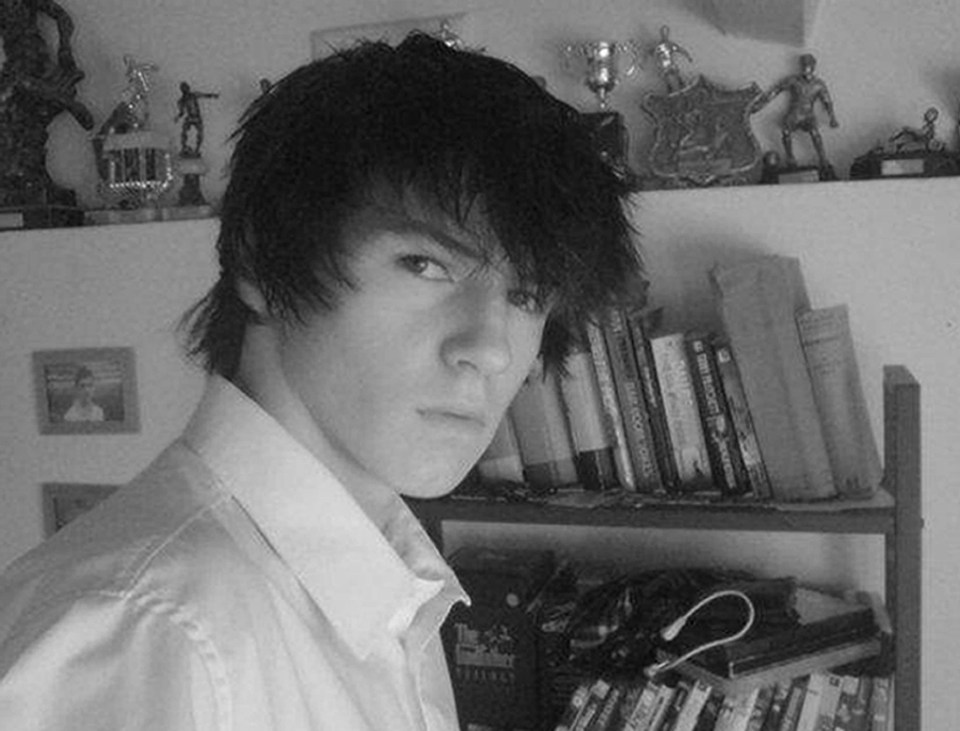 Portrait of Ben Kinsella, a young man with dark hair, looking intently at the camera.