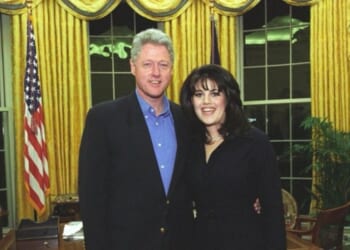 Now-former President Bill Clinton takes a photo with intern Monica Lewinsky.