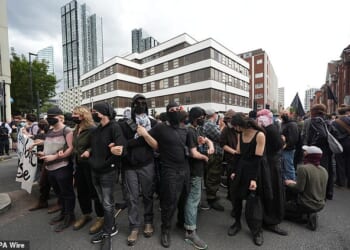 The Home Office has 'squandered' billions of pounds on asylum hotels, a damning report has found (Pictured: A protest against migrants at the Thistle City Barbican Hotel in London, August 2025)