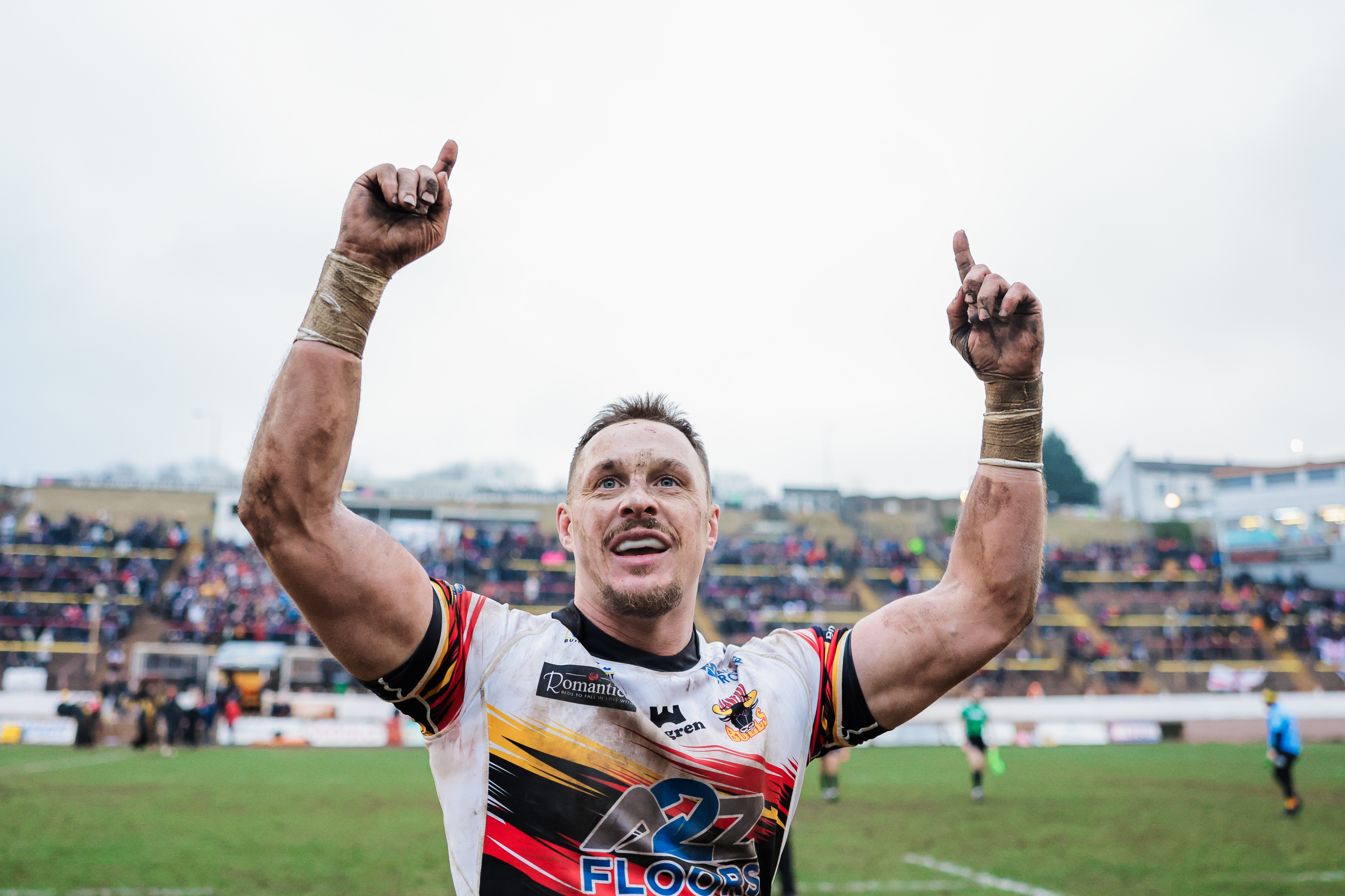 A Bradford Bulls player celebrates a score against the Castleford Tigers.
