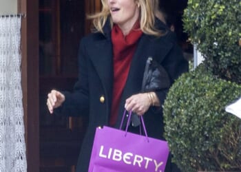 Cat Deeley looked effortlessly chic in a red roll neck jumper and navy coat as she enjoyed a girls' day out in London on Friday