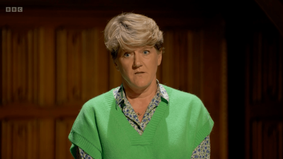 BBC presenter Clare Balding wearing a green sleeveless V-neck sweater over a floral shirt.