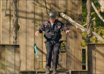 Celebrity Traitors star Alan Carr left fans in hysterics as he screamed while crossing a wobbly bridge during Wednesday's episode as viewers deem him a 'national treasure'
