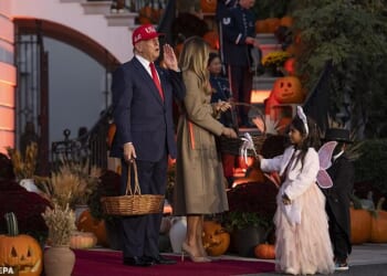 The FBI says it thwarted a potential terrorist attack this weekend as millions prepare for Halloween festivities. Pictured: Donald Trump and first lady Melania welcome trick-or-treaters to the White House on October 30, 2025