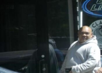 Defendant Zhen Hu allegedly threatened and attacked victims of the illegal poker ring