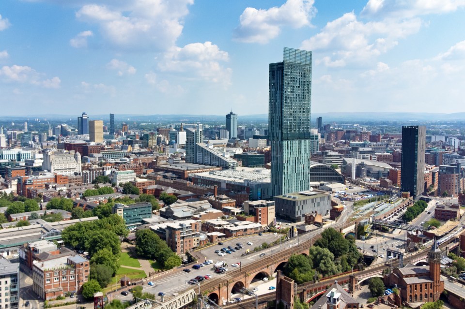 Wide-angle aerial view of the skyline of Manchester, England, UK.