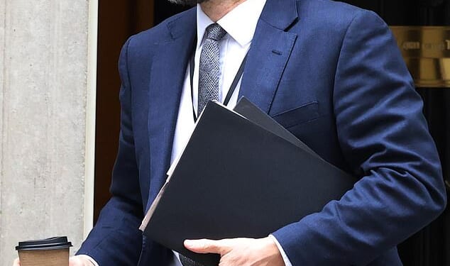 A blame game erupted with Matthew Collins named by ministers as being responsible for failing to say China was Britain's enemy