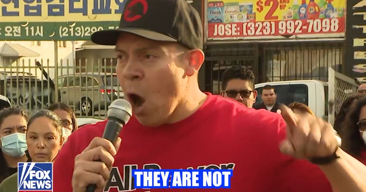 A school teacher identified as Ron Gochez is under investigation for telling a crowd "they're not the only ones with guns!" during an anti-ICE protest.