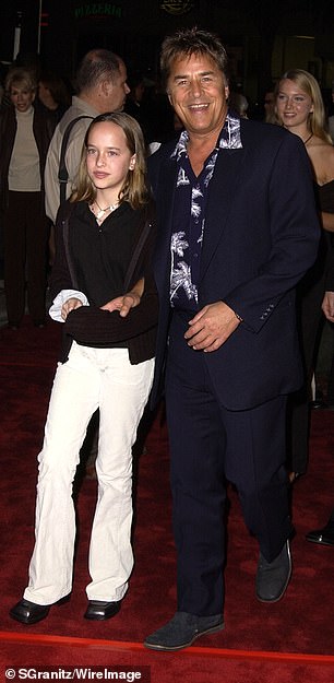Johnson seen with dad Don Johnson in 2001