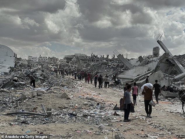 Trucks carrying humanitarian aid and fuel enter Gaza through Karem Abu Salem crossing and reach Khan Yunis under cease-fire agreement in Gaza on October 12, 2025