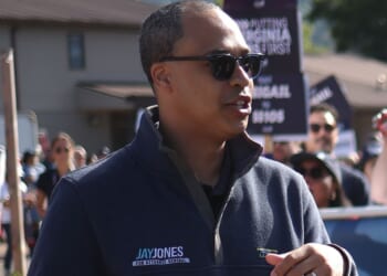 Democratic candidate for Virginia Attorney General Jay Jones marches in the 54th Annual Buena Vista Labor Day Festival parade in Buena Vista, Virginia, on Sept. 1.
