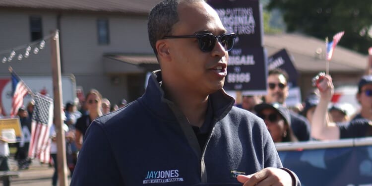 Democratic candidate for Virginia Attorney General Jay Jones marches in the 54th Annual Buena Vista Labor Day Festival parade in Buena Vista, Virginia, on Sept. 1.