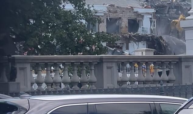 Photos on Monday showed a backhoe ripping into the once-pristine structure that has formed part of the White House complex for more than a century