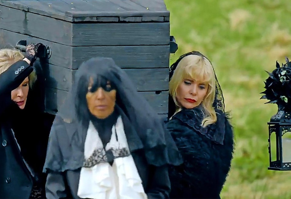 Paloma Faith and Claudia Winkleman at a funeral procession with three coffins.