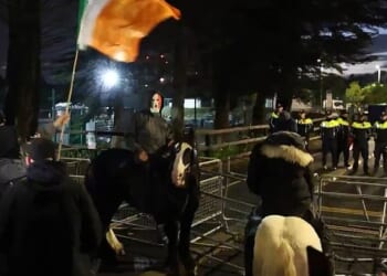 Marauding hordes of masked yobs – some on horseback (pictured) - descended on the prosperous Dublin suburb of Saggart armed with rocks, fireworks and even fire bombs