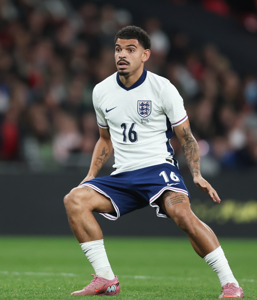 Morgan Gibbs-White wearing England's white uniform during an international friendly match.