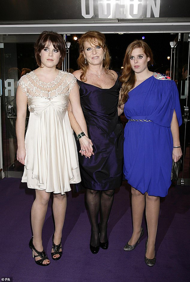Emails from Jeffrey Epstein reveal Fergie was so desperate to cosy up to him that 'she was the first to celebrate' his release from jail 'with her two daughters in tow'. The former Duchess (M) pictured with Princess Eugenie (L) and Princess Beatrice (R), at a film premiere in 2009.