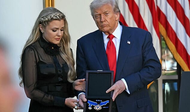 US President Donald Trump and Erika Kirk (L), Charlie Kirk's widow, participate in a Medal of Freedom Ceremony for late US right-wing activist Charlie Kirk in the Rose Garden