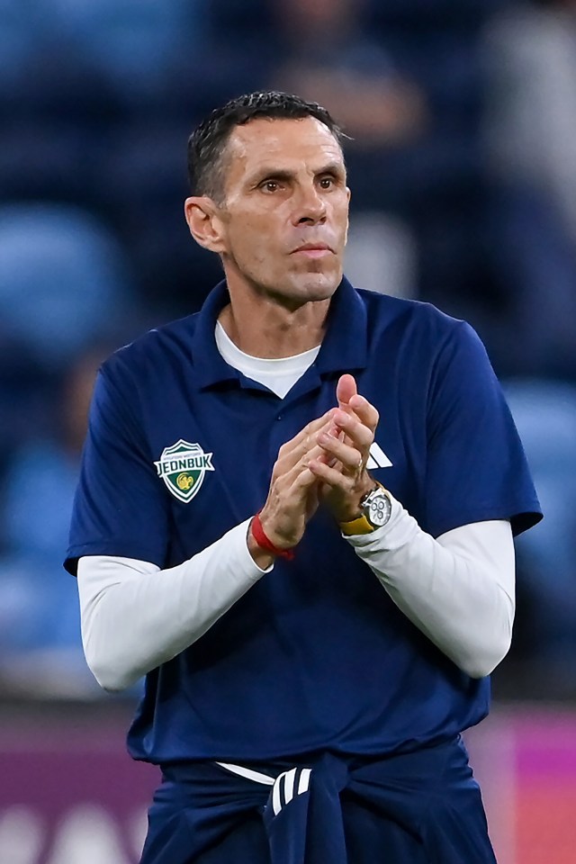 Head Coach Gustavo Poyet of Jeonbuk Hyundai Motors FC gestures to fans.