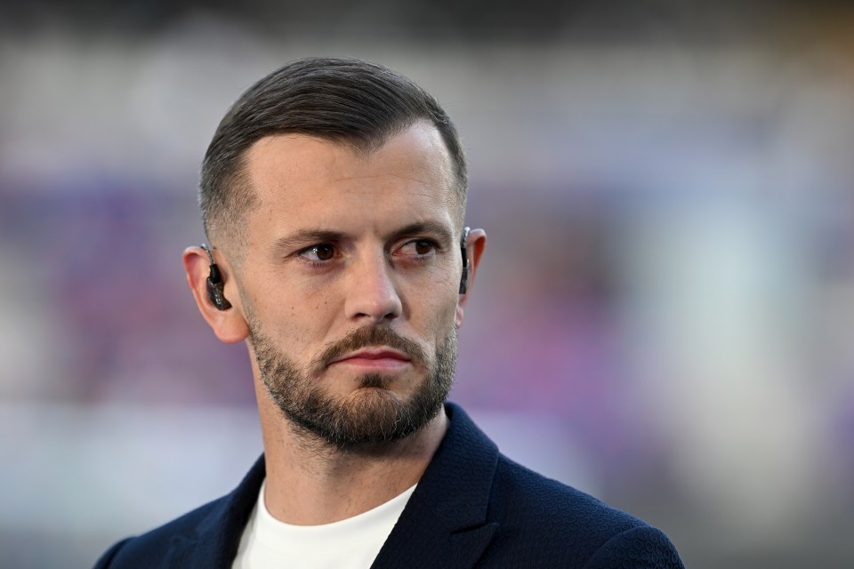 Jack Wilshere, Interim Head Coach of Norwich City, looks on.