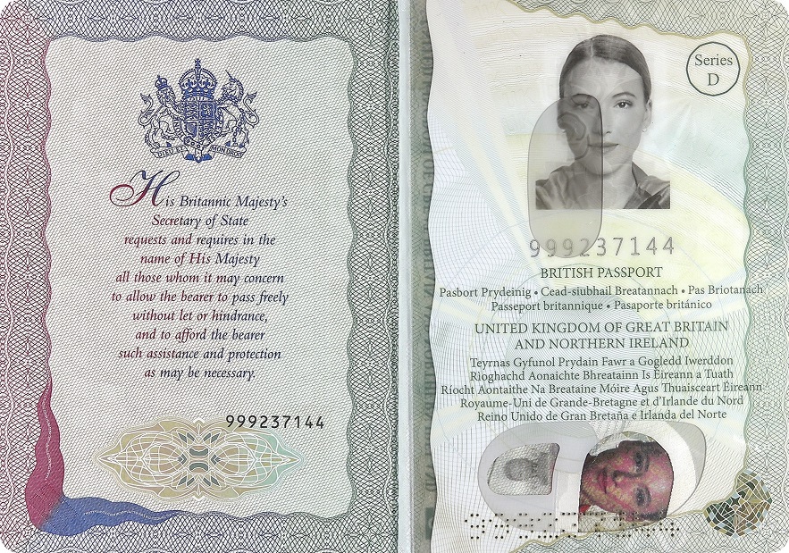 Open British passport with King Charles III's Coat of Arms and an example photo and text.