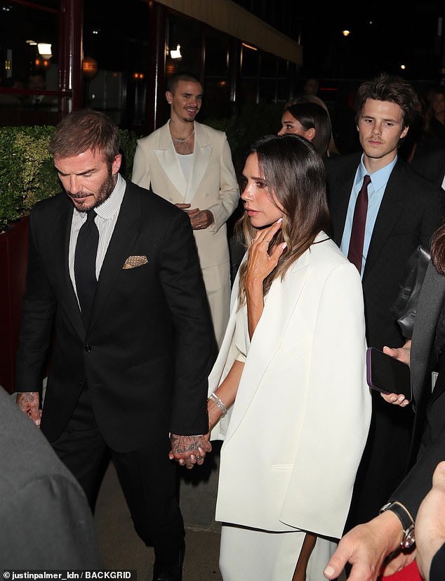 The mother-of-four was joined by her dapper husband David, 50, and sons Romeo, 23, and Cruz, 20, with his girlfriend Jackie Apostel, 30