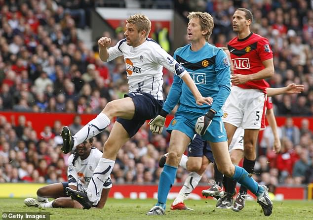 Klasnic (left), pictured playing for Bolton against Man United in 2009, says he is furious at having had to endure his painkiller hell