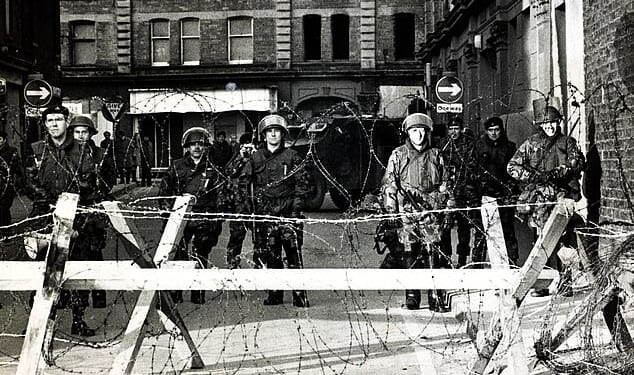 British troops behind a barbed wire barricade at Bloody Sunday in 1972