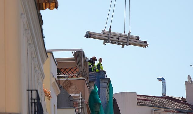 Spanish emergency services have recovered the bodies of four people from beneath the rubble of a six-storey building that collapsed in central Madrid