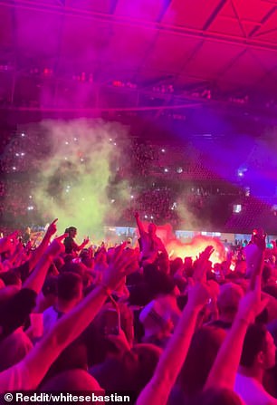 But the iconic brothers were left stunned halfway through their song Champagne Supernova when one fan set off a flare in the middle of their set