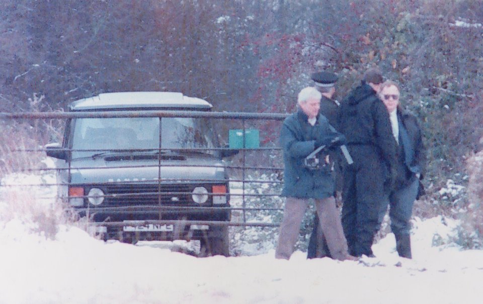 Police examining a Range Rover after the Rettendon shooting.