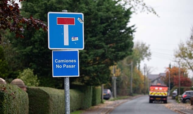 Villagers in a rural farming community have installed Spanish road signs in an effort to warn off lost lorry drivers - but the council has pledged to take them down