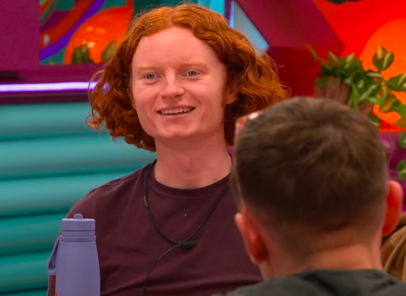 George from Big Brother smiling.