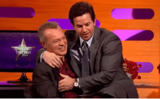 Mark Wahlberg hugging Graham Norton on the Graham Norton Show.