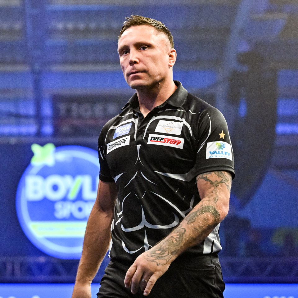 Gerwyn Price walking off stage for a break.