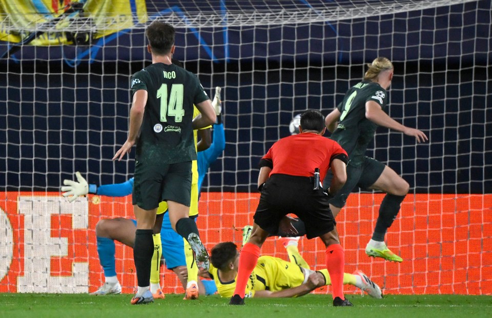 Erling Braut Haaland scoring Manchester City's first goal against Villarreal.
