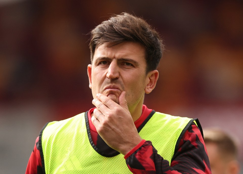 Manchester United's Harry Maguire warms up before a Premier League match.