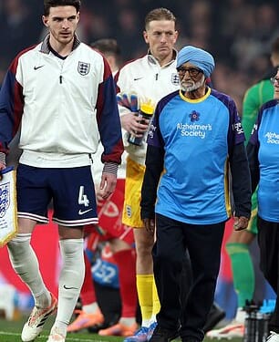 England and Wales players walked out with mascots with dementia ahead of their match at Wembley on Thursday