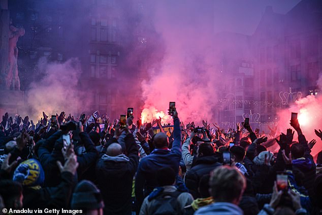The Israeli fans, pictured last November in Amsterdam, have been asked by West Midlands Police to stay from the fixture at Villa Park in Birmingham