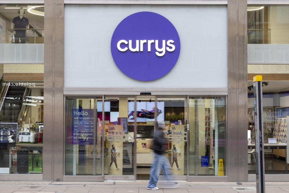A Currys Plc store in central London with its logo visible above the entrance.