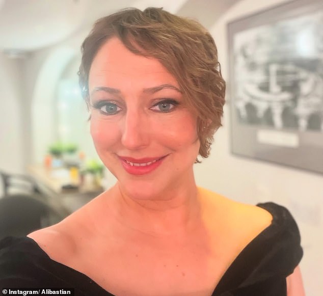 Ali Bastian said she is feeling more like herself in a glamorous snap following her brutal breast cancer battle as she headed to West Life's 25th anniversary show