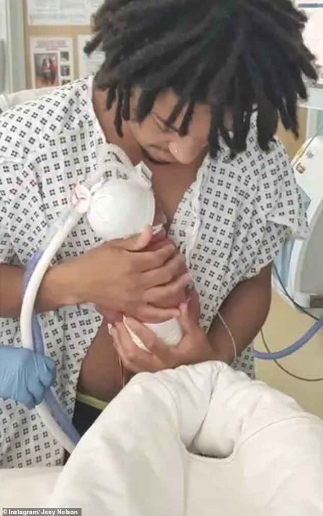 Zion Foster pictured with the newborn
