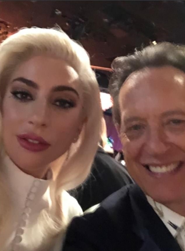 Richard's love of the celebrity selfie began during his road to the Oscars in 2019 after he was nominated for the first time (pictured with Lady Gaga)