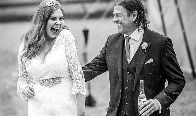 There was a touch of deja vu at play as handsome groom Sean Bean and his beaming wife, resplendent in an Alice Temperley bridal gown, posed for a tasteful monochrome photo moments after their intimate wedding ceremony (pictured)