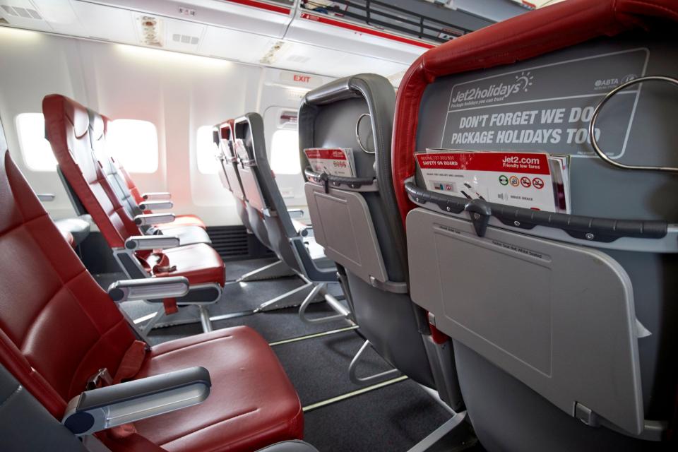 Empty Jet2 passenger aircraft seating.
