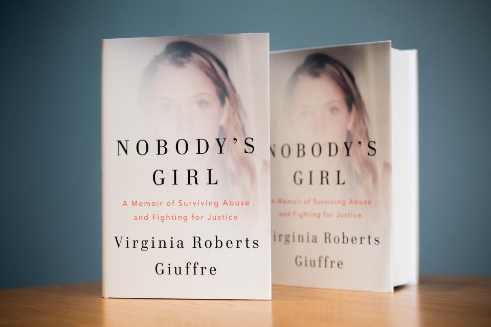 Two copies of "Nobody's Girl: A Memoir of Surviving Abuse and Fighting for Justice" by Virginia Roberts Giuffre.