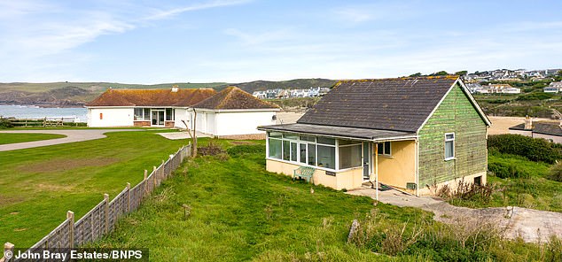 Although the property is unassuming it is being sold with planning permission to demolish it and replace it with two contemporary and energy-efficient five-bedroom homes